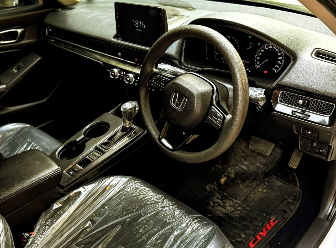 CIVIC RS TURBO 
model & registration 2023